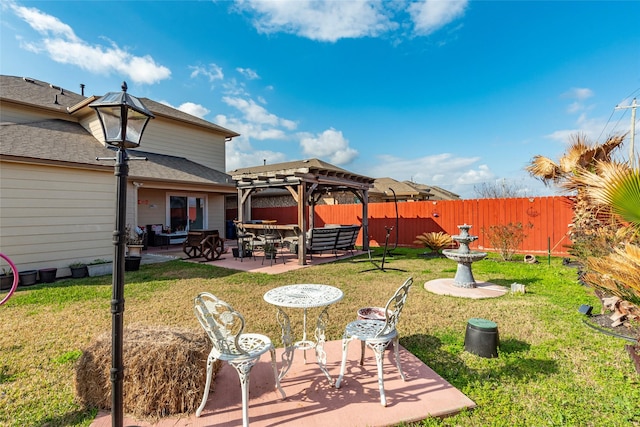 view of yard featuring a pergola and a patio area