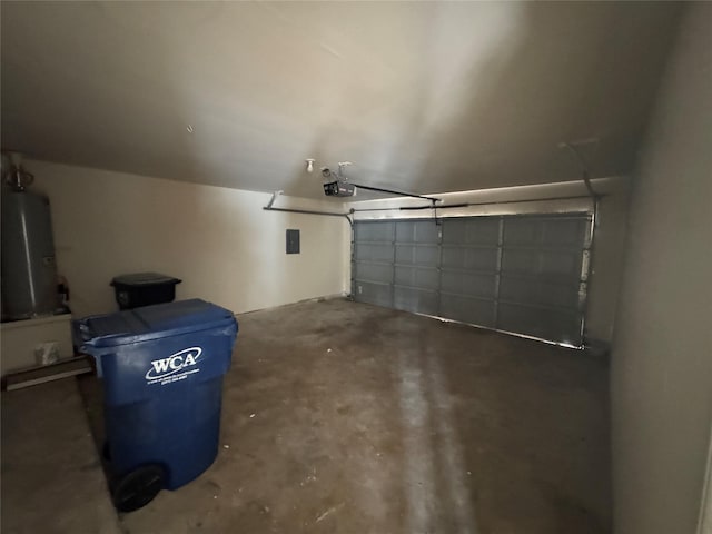 garage with a garage door opener, electric panel, and water heater