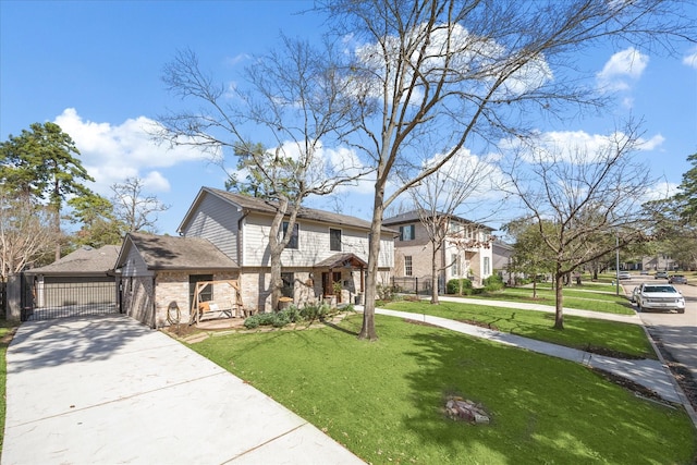 view of front of house with a garage and a front yard