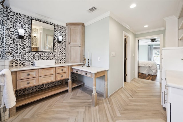 bathroom featuring crown molding, parquet flooring, and vanity