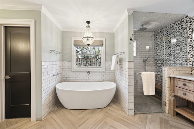 bathroom with tile walls, vanity, ornamental molding, parquet flooring, and separate shower and tub