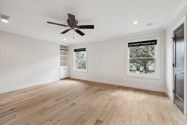 unfurnished bedroom featuring crown molding, ceiling fan, and light wood-type flooring