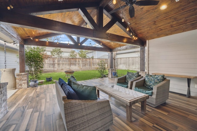 deck with an outdoor living space, a gazebo, a yard, and ceiling fan