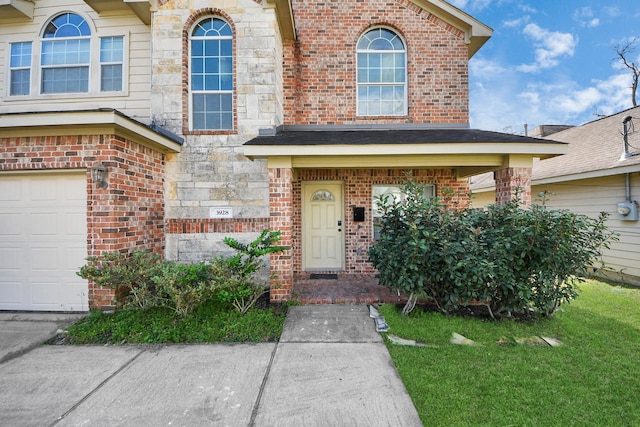 view of front of property featuring a garage