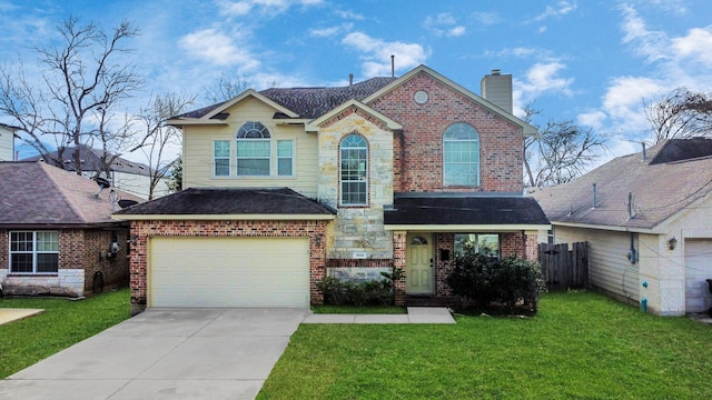 view of property with a garage and a front lawn