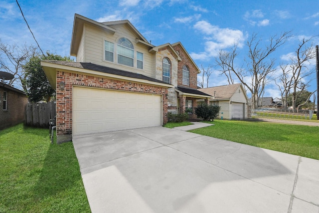 view of front of house with a garage and a front lawn