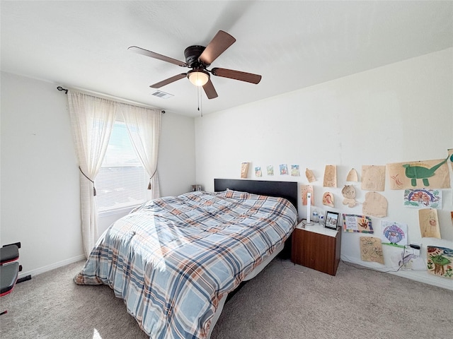 bedroom with light colored carpet and ceiling fan