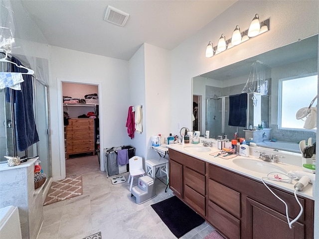 bathroom featuring vanity and plus walk in shower