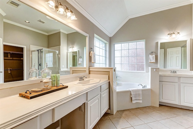 bathroom featuring tile patterned flooring, crown molding, vaulted ceiling, and shower with separate bathtub