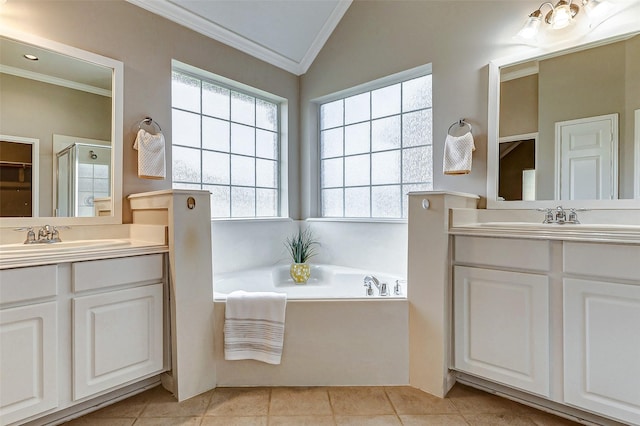 bathroom with vaulted ceiling, vanity, crown molding, and tile patterned flooring