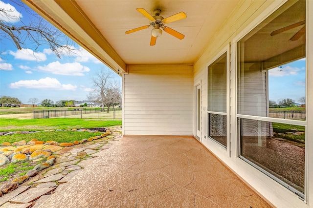 view of patio with ceiling fan