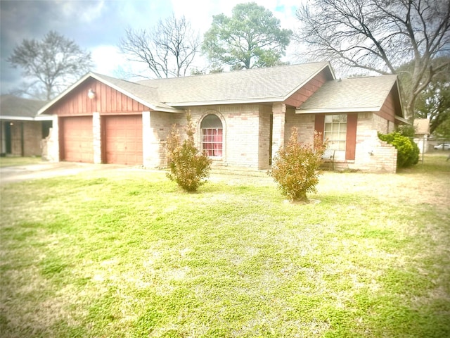 ranch-style house featuring a garage and a front lawn