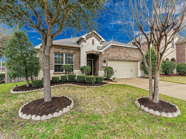 view of front of house with a garage and a front lawn