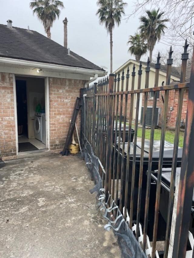 exterior space with washer / dryer