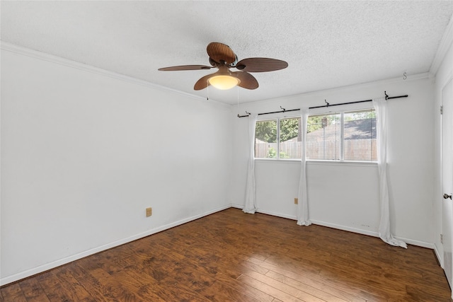 unfurnished room featuring crown molding, ceiling fan, dark hardwood / wood-style floors, and a textured ceiling