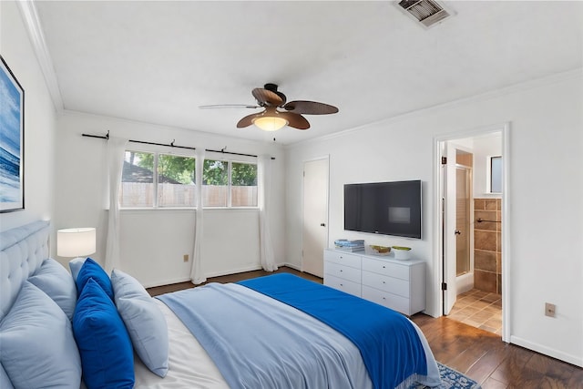 bedroom featuring crown molding, dark hardwood / wood-style floors, and ceiling fan