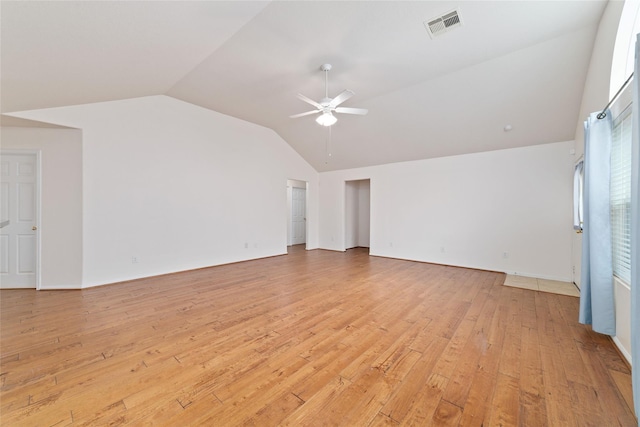 unfurnished living room with lofted ceiling, light hardwood / wood-style flooring, and ceiling fan