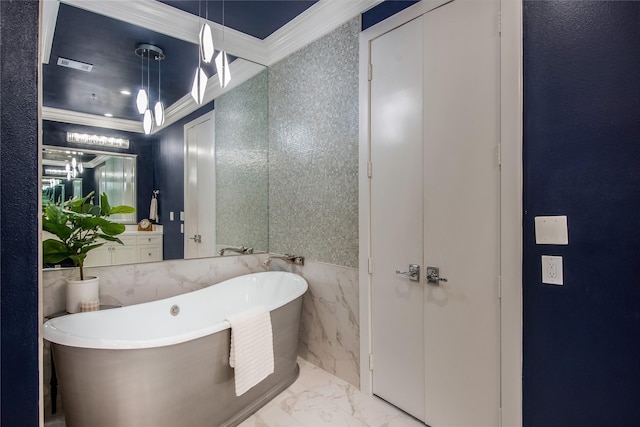 bathroom with a soaking tub, visible vents, ornamental molding, and marble finish floor