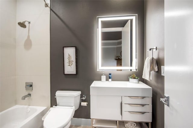 full bathroom featuring vanity, toilet, and tiled shower / bath combo