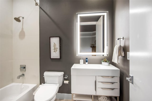 full bathroom featuring vanity, washtub / shower combination, and toilet