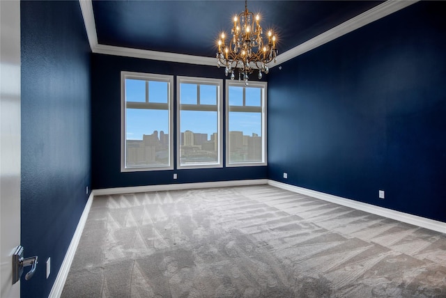 empty room featuring ornamental molding, carpet flooring, and an inviting chandelier