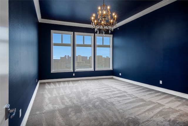 spare room featuring crown molding, carpet floors, baseboards, and a notable chandelier