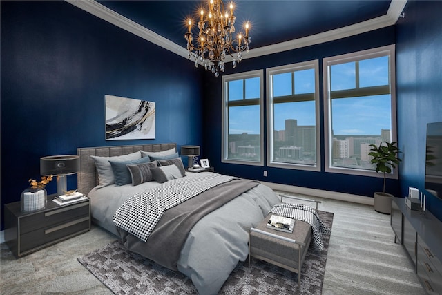 bedroom with an inviting chandelier, ornamental molding, and carpet flooring