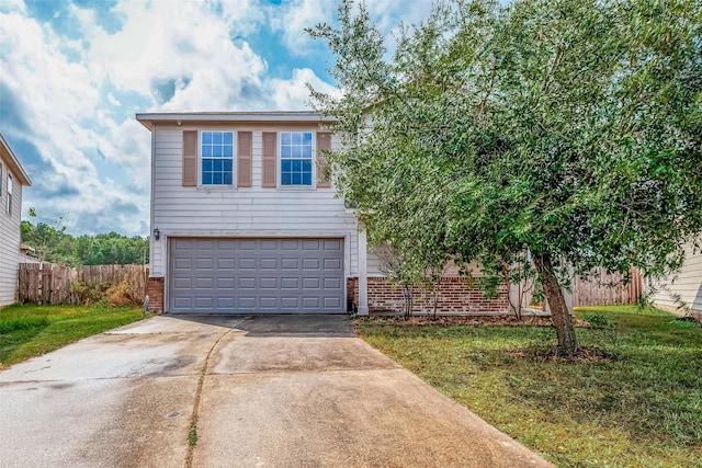 view of front of house with a garage and a front lawn