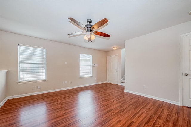 unfurnished room featuring hardwood / wood-style floors and ceiling fan