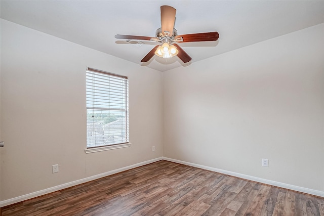 unfurnished room with hardwood / wood-style flooring and ceiling fan