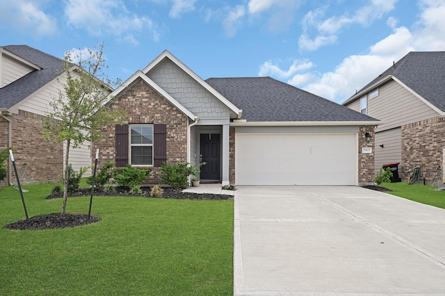 craftsman inspired home with a garage and a front lawn