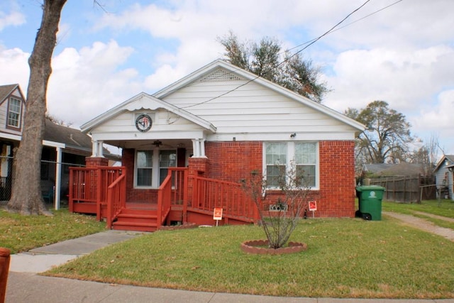 bungalow with a front lawn