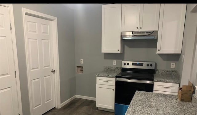 2606 Carson Dr, Katy, TX 77493 - kitchen featuring extractor fan, white cabinetry, baseboards, electric stove, and light stone countertops