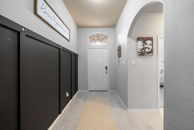 doorway to outside featuring light hardwood / wood-style flooring