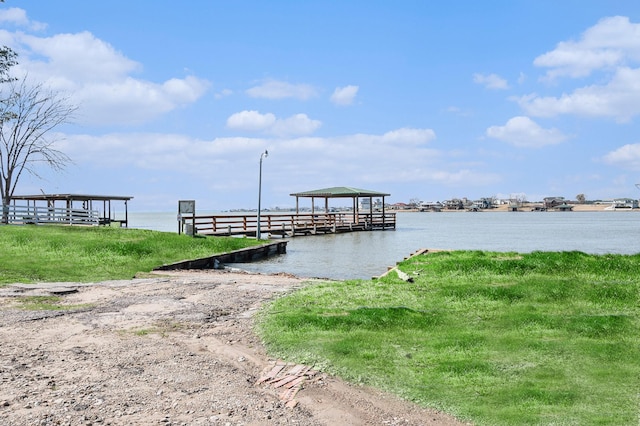 view of dock with a water view and a gazebo