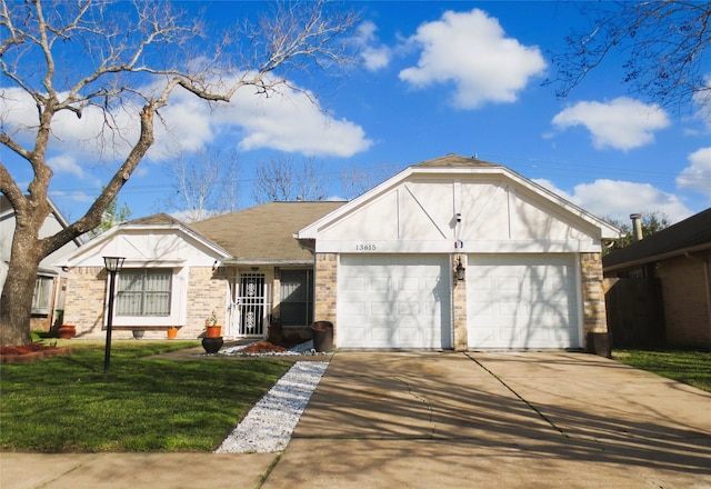 view of front facade featuring a garage and a front lawn