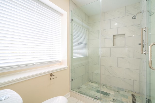 bathroom featuring walk in shower