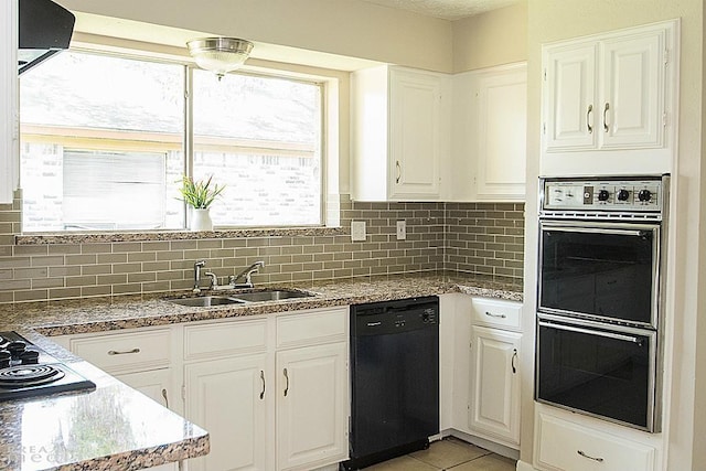 kitchen with tasteful backsplash, white cabinets, sink, and black appliances