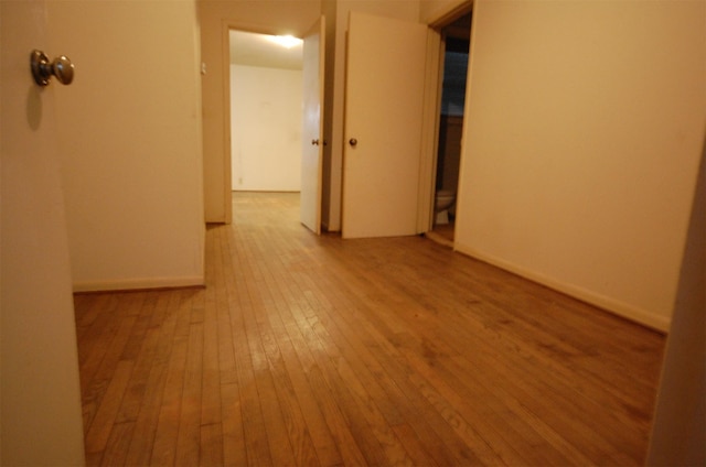 unfurnished room featuring light hardwood / wood-style flooring