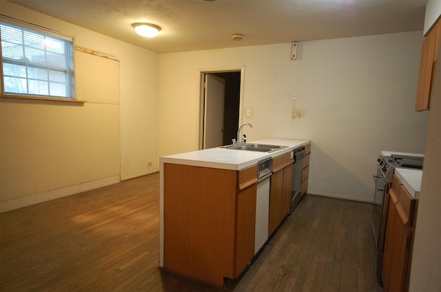 kitchen with dark hardwood / wood-style floors, sink, black dishwasher, and stainless steel stove