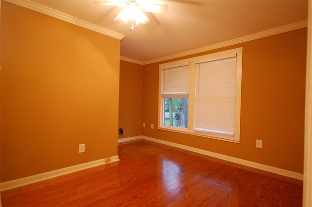 unfurnished room with crown molding, ceiling fan, and wood-type flooring