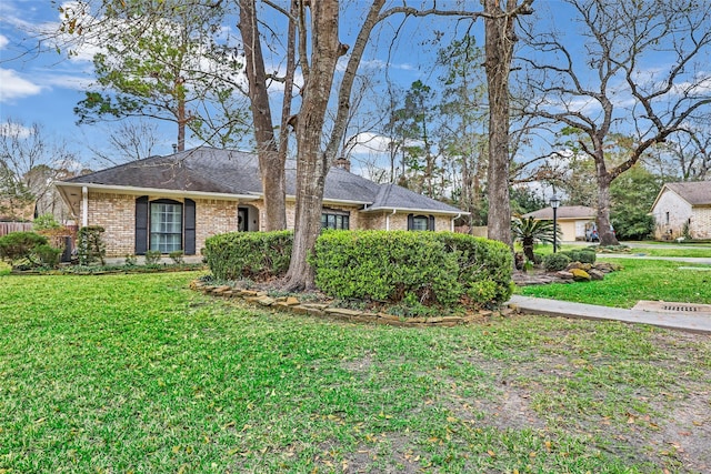 ranch-style house with a front yard