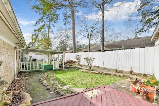 view of yard featuring a deck