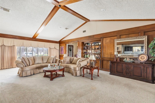 carpeted living room featuring lofted ceiling with beams and a textured ceiling