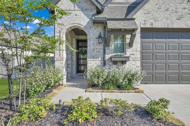 property entrance featuring a garage