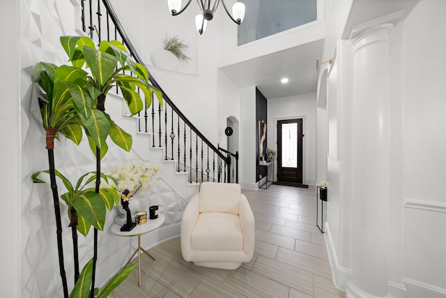 foyer entrance featuring a high ceiling