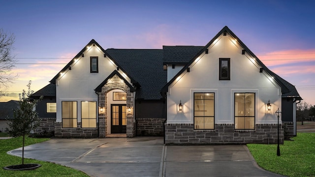 view of front of home with a yard