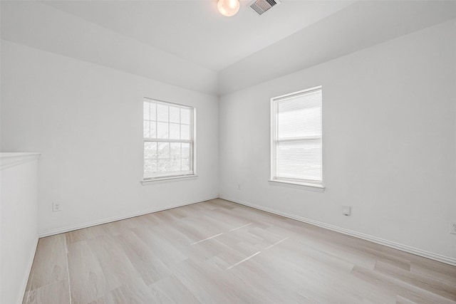 empty room with light wood-type flooring