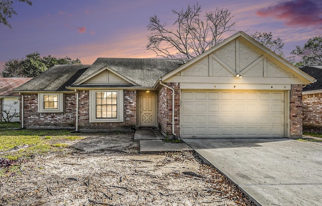 single story home featuring a garage