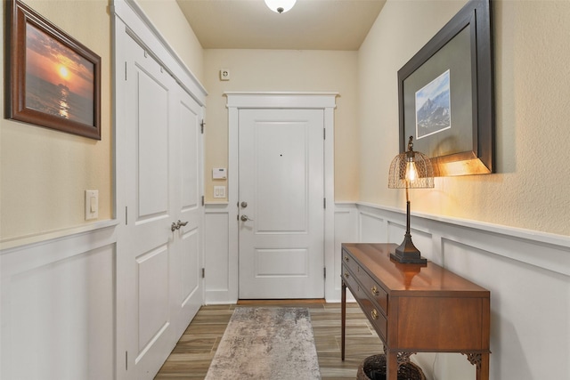 doorway to outside with dark hardwood / wood-style floors